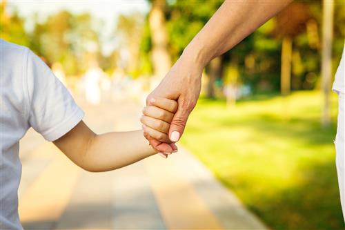 Parent and Child Holding Hands 